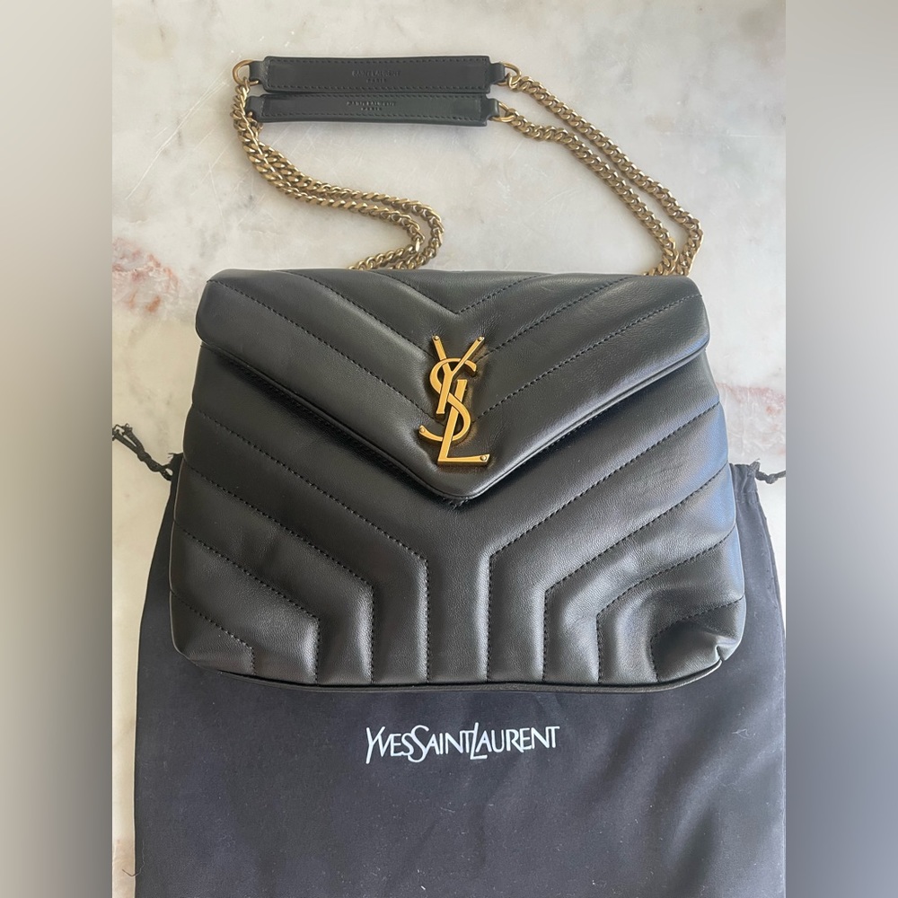 Brand new YSL Lou Lou bag small. Black leather. Comes with dust bag. NEVER USED.
